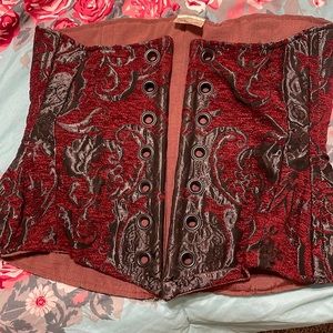 Damsel in this dress corset